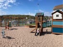 summer kiosk by the sea with people and boats